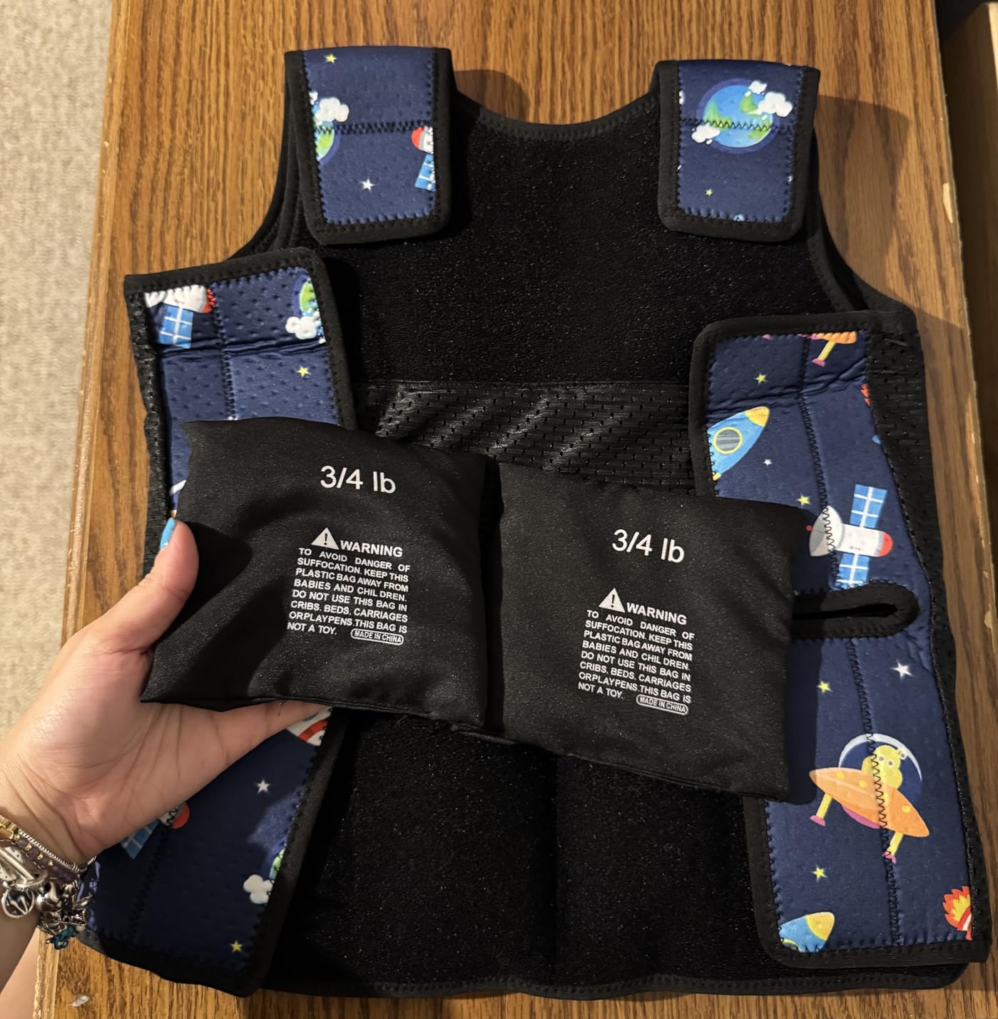 Janmercy Weighted Vest for Kids Ages 4 to 7 and Ages 8+ Boy Girl Adjustable Breathable Compression Vest for Processing Issue(Rocket,Medium,Dark Blue) customer photo 1