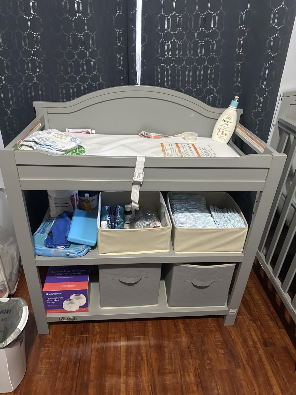 Graco Story Changing Table with Water-Resistant Pad - GREENGUARD Gold Certified Baby Changing Station with Safety Strap, 2 Open Shelves, and a Nursery Must-Have Design (Driftwood) customer photo 1
