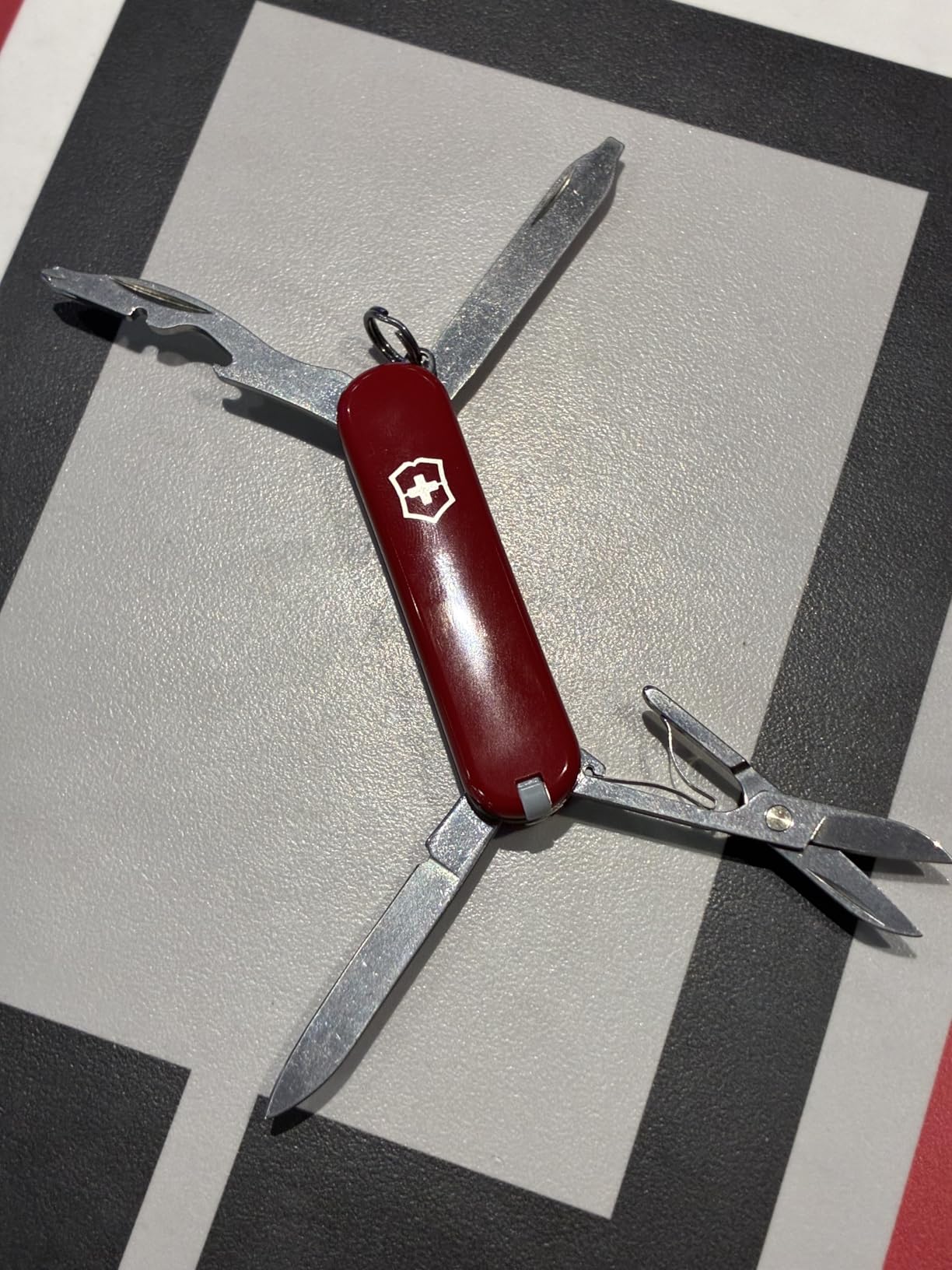 Victorinox Rambler Swiss Army Knife, 10-Function Pocket Knife, Red | Swiss-made multitool, compact pocket knife, multiple functions, everyday readiness customer photo 1