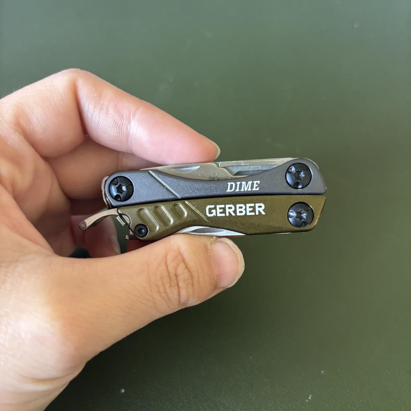 Gerber Dime 12-in-1 Mini Multitool Pliers, Pocket Knife, Bottle Opener, Black | Needle nose pliers, pocket knife, bottle opener, scissors, 12 tools, compact EDC gear, camping, keychain clip, gifts for men customer photo 1