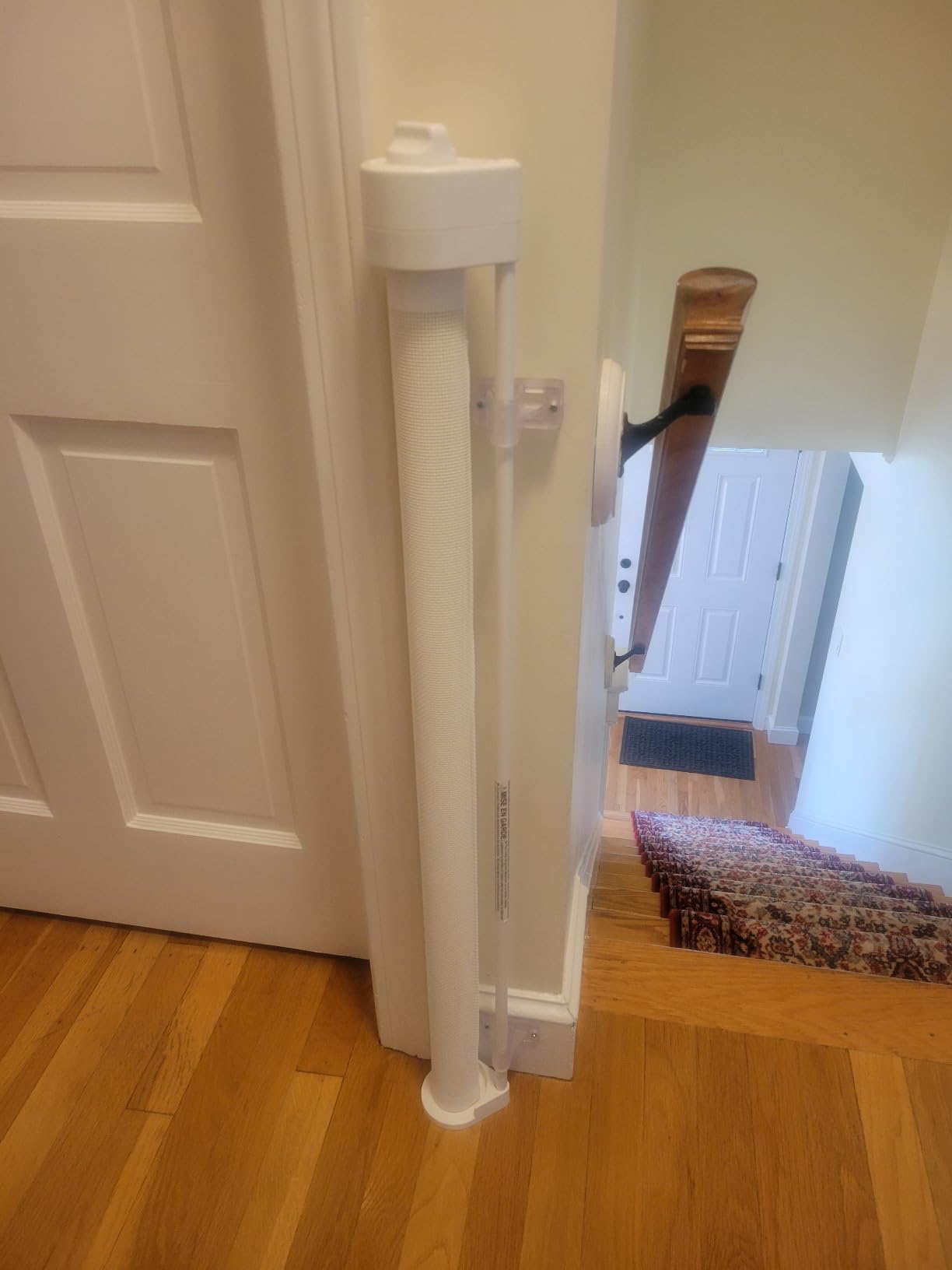 Retract-A-Gate 52 Inch White Retractable Baby and Dog Gate, Made in USA | The original certified retractable gate for top & bottom stairs; 200lb push-out force, angled installs, wide, tall, & sleek customer photo 1