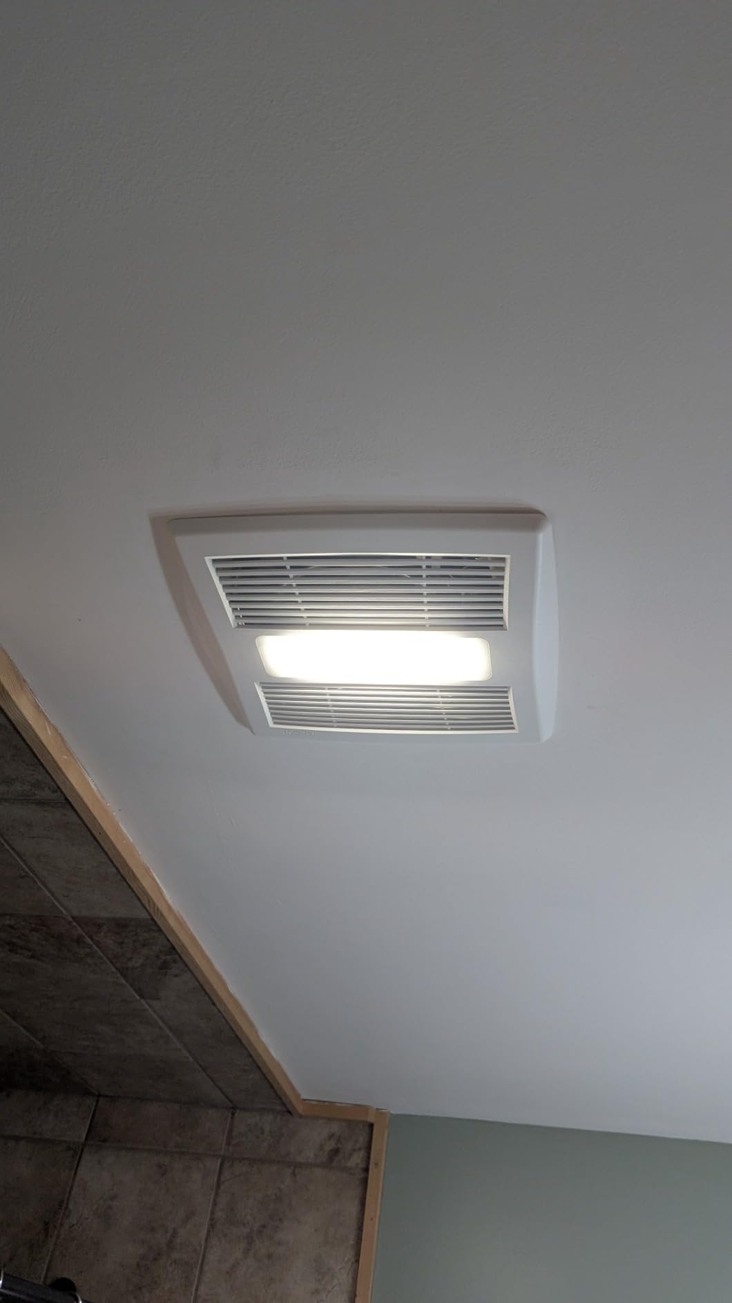Broan-NuTone Bathroom Exhaust Fan with LED Light and Roomside Installation, Energy Star Certified, 110 CFM, Very Quiet 1.0 Sones White, AE110L customer photo 2