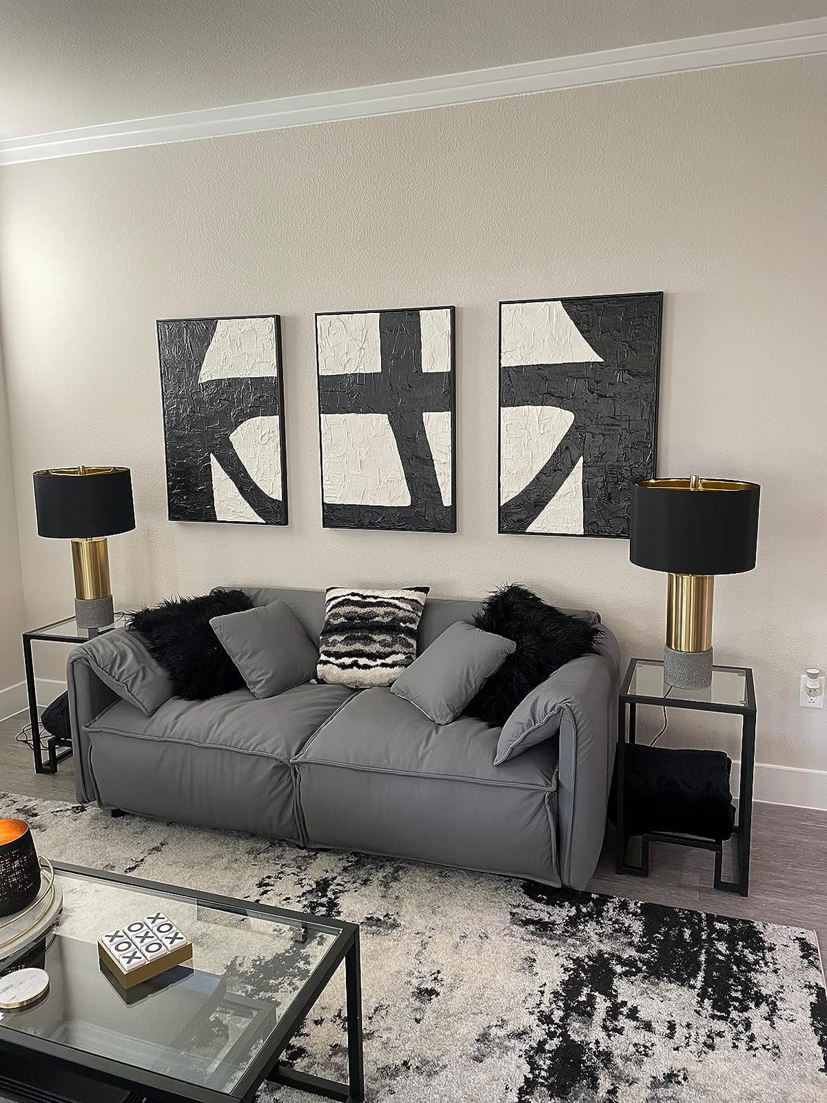 Signature Design by Ashley Jacek Contemporary Table Lamp Set of 2 | Textured faux concrete and brass-finished metal, Black drum shade with goldtone foil interior, Living room and bedside use customer photo 2