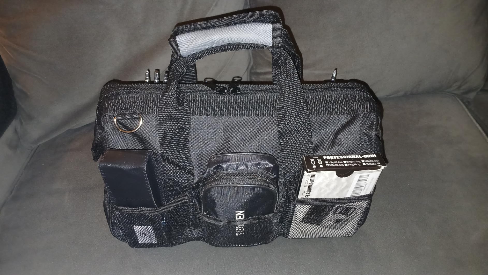 Amazon Basics Durable Wear-Resistant Tool Storage Bag with Adjustable Shoulder Strap, Portable Tool Organizer, 16 in, Black & Grey customer photo 1
