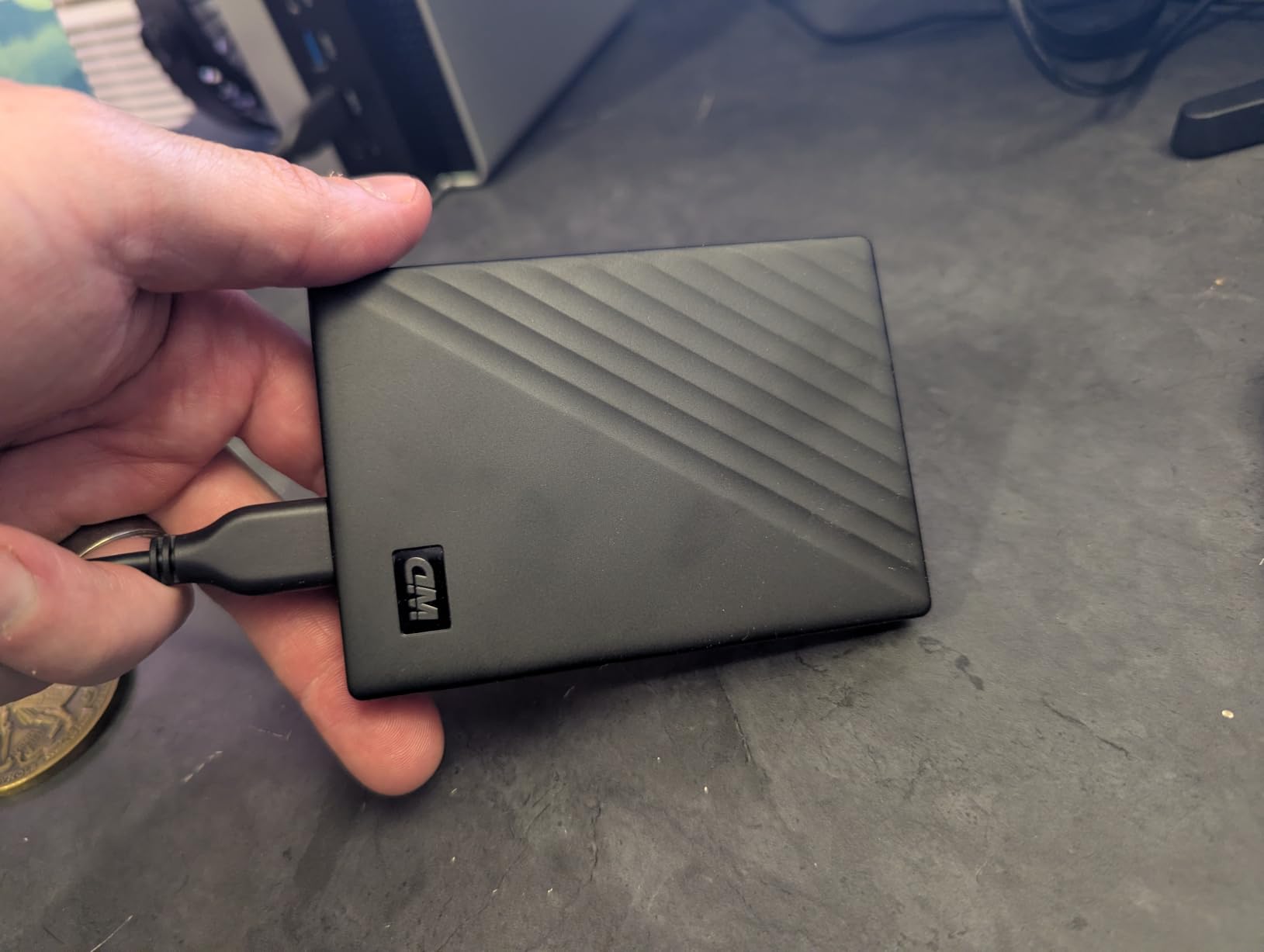 WD 2TB My Passport Portable External Hard Drive, Black, backup software with ransomware defense, password protection, USB 3.1/USB 3.0 (WDBYVG0020BBK-WESN) customer photo 1