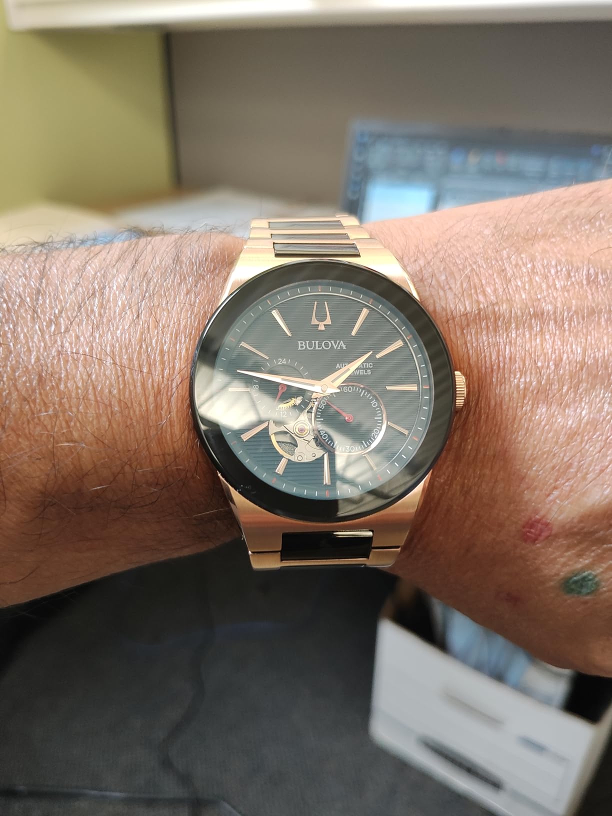 Latin Grammy Modern Millenia Automatic Two-Tone Stainless Steel Watch, Open Heartbeat Aperture, Exhibition Case Back, Black Dial, (Model: 98A236) customer photo 2