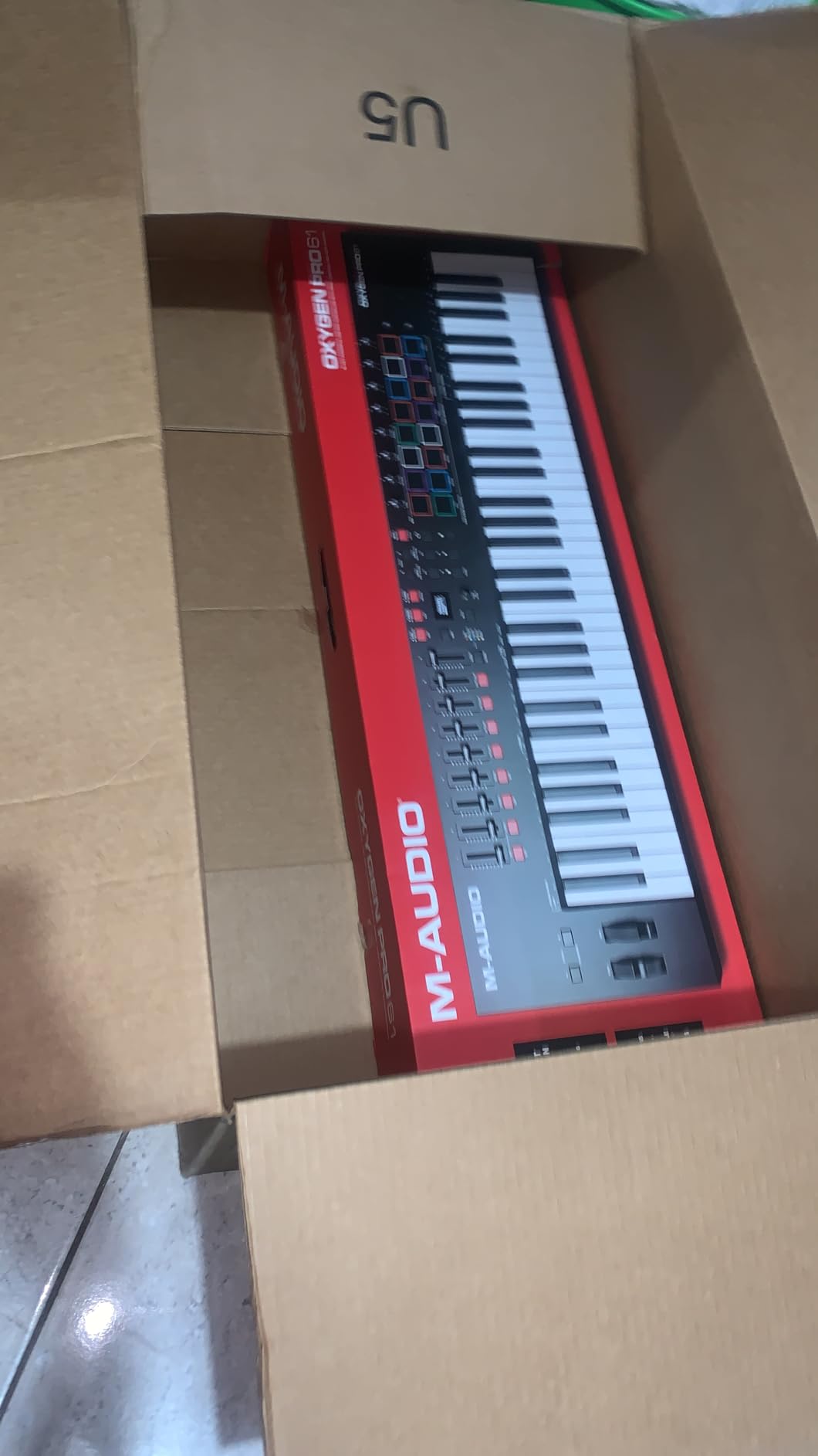 M-AUDIO Oxygen Pro 61 USB MIDI Keyboard Controller | 61 Velocity-Sensitive Keys, 16 Beat Pads, 8 Knobs, 9 Faders, and Bundled DAW Recording Software, for Music Production customer photo 1
