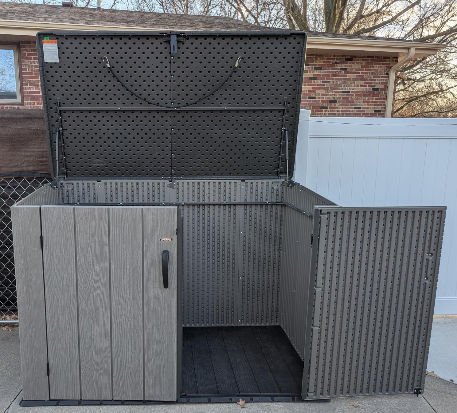 Suncast Horizontal Outdoor Storage Shed, Weather Resistant Resin Storage Can Fit Two Large Garbage Cans, Lockable Doors, Spring-Hinge Lid, Low-Maintenance Backyard Utility Shed customer photo 1
