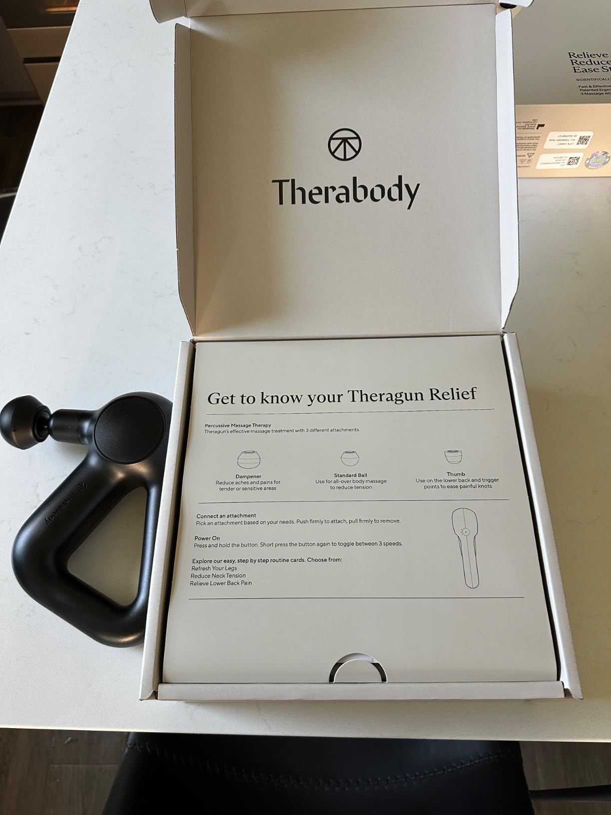 TheraGun Therabody Relief Massage Gun | for Daily Comfort | 3-Speed | Navy | Quiet Handheld Percussion Muscle Massager for Back, Leg & Shoulder Pain Relief. Lightweight, Easy to Use, Ergonomic Grip customer photo 2