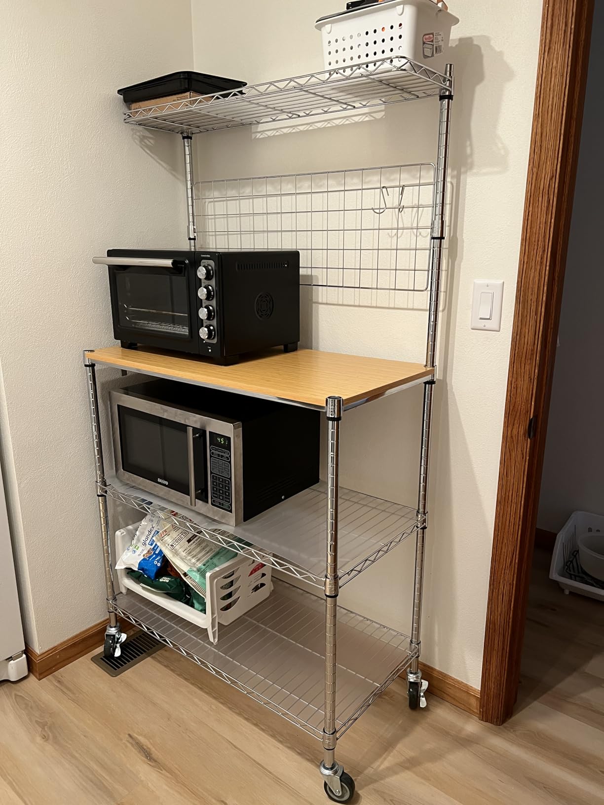 Bakers Rack with Power Outlet & Storage, 36In Microwave Stand Kitchen Cart | 4-Tier Metal Kitchen Shelves Cart with Wheels & 20 S-Hooks for Kitchen, NSF Certified, 63 x 18 x 36 Inch-Chrome customer photo 1