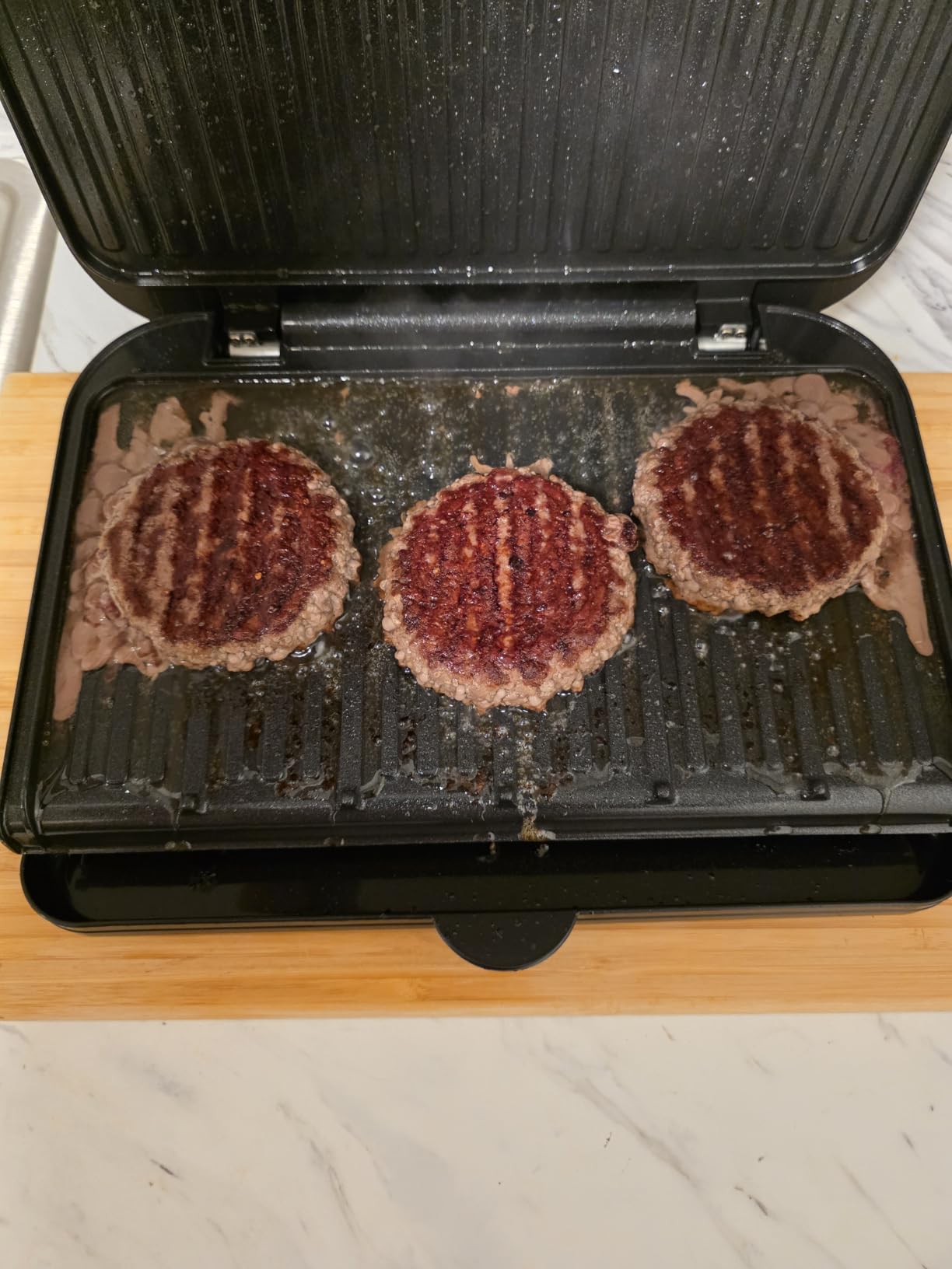 George Foreman Family Grill & Panini Press, PFAS-Free Ceramic Nonstick, Adjustable Angle, Removable Drip Tray, Family-Size Cooking Surface customer photo 1