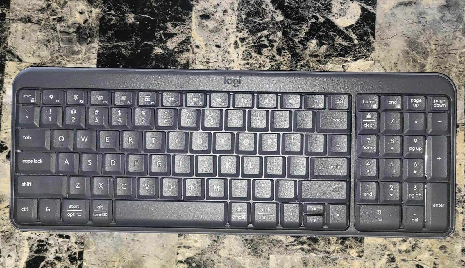 Logitech K250 Compact Wireless Bluetooth Keyboard with Number Pad, Graphite | Bluetooth only, no USB receiver, full number pad, deep-profile keys, responsive typing, spill-resistant, for Windows, MacOS customer photo 1