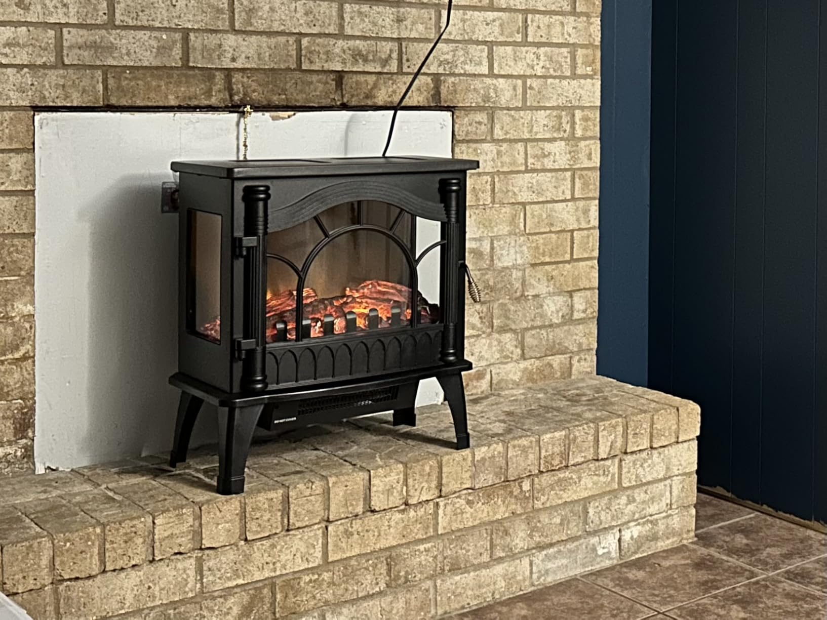 ZAFRO Electric Fireplace Stove with Dual Heat & Flame-Only Mode, 5100 BTU | 1000W/1500W Settings for Fast Warmth, Built-In Thermostat, ETL, Overheat Protection, for Living Room, Bedroom, 22 in customer photo 1