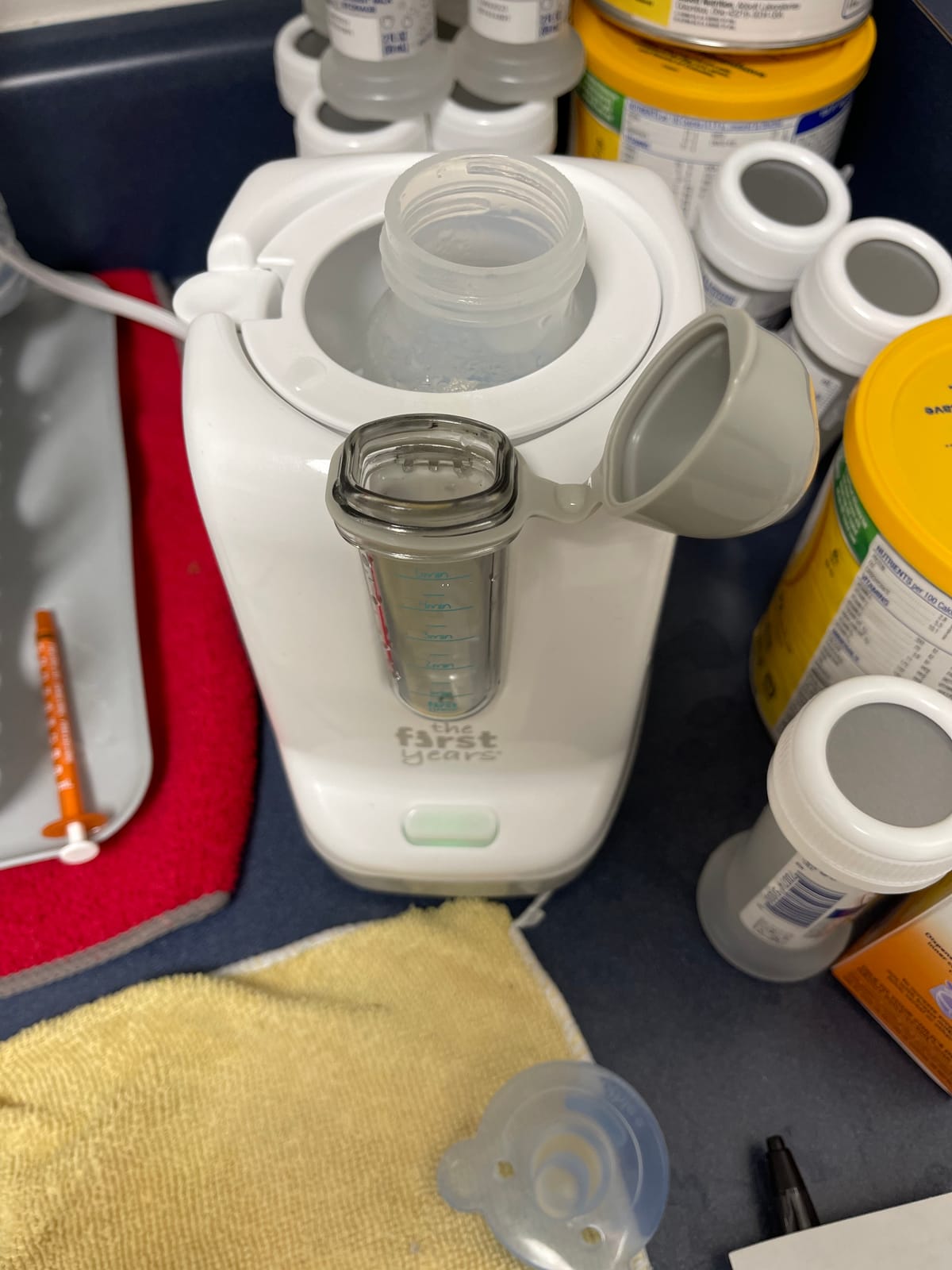 The First Years Baby Bottle Warmer and Sterilizer - Pacifier and Bottle Nipple Sanitizer - Feeding Baby Essentials for Formula or Breast Milk - Holds Multiple Sizes customer photo 2