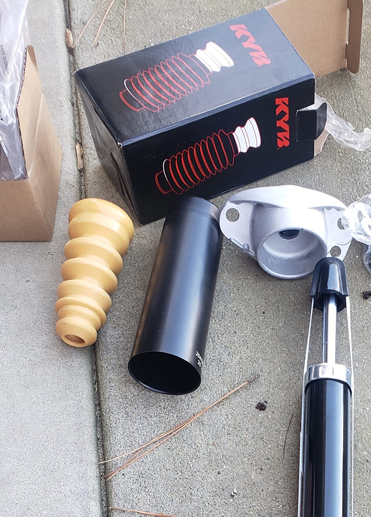 KYB SB125 - Strut Boot | Shields the strut from grit to prevent early wear; replaces a torn strut boot/bellows. Direct-fit OE replacement. customer photo 2