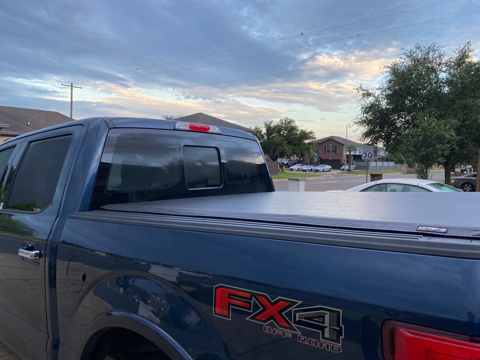 RealTruck TruXedo Lo Pro Soft Roll Up Truck Bed Tonneau Cover | 597701 | Fits 2015-2026 Ford F-150 5' 7
