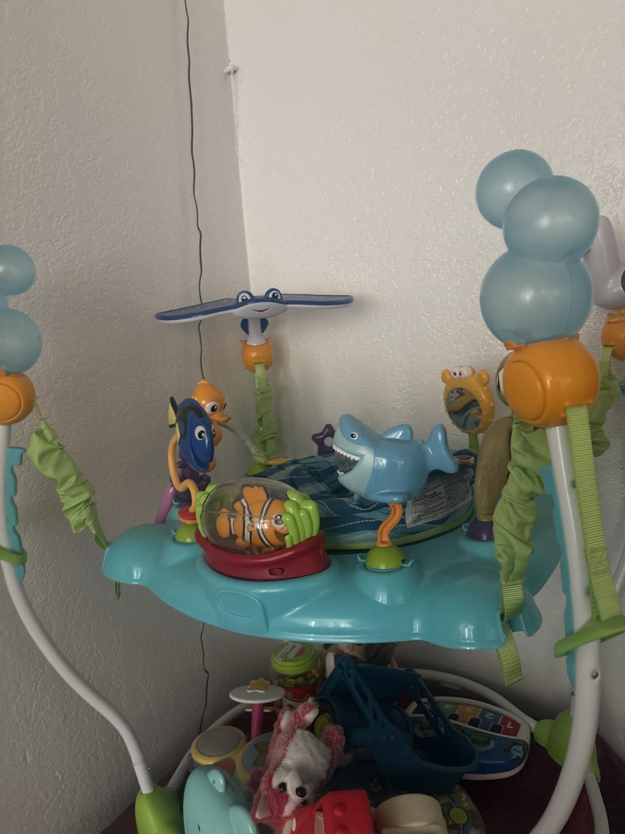 Bright Starts Disney Baby Finding Nemo Sea of Activities Baby Activity Center Jumper with Interactive Toys, Lights, Songs & Sounds, 6-12 Months (Blue) customer photo 2