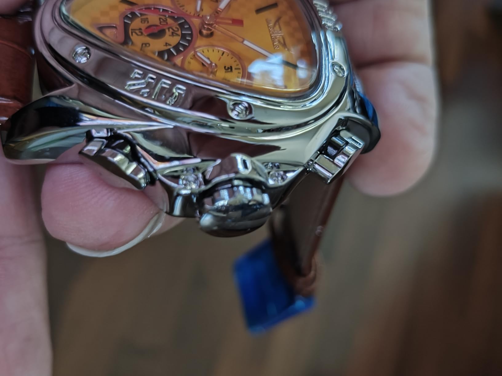 Winner Fashion Mechanical Wrist Watch Triangle Racing Dial, Waterproof Golden Skeleton Dial Automatic Movement Leather Design Mechanical Watch for Men customer photo 1