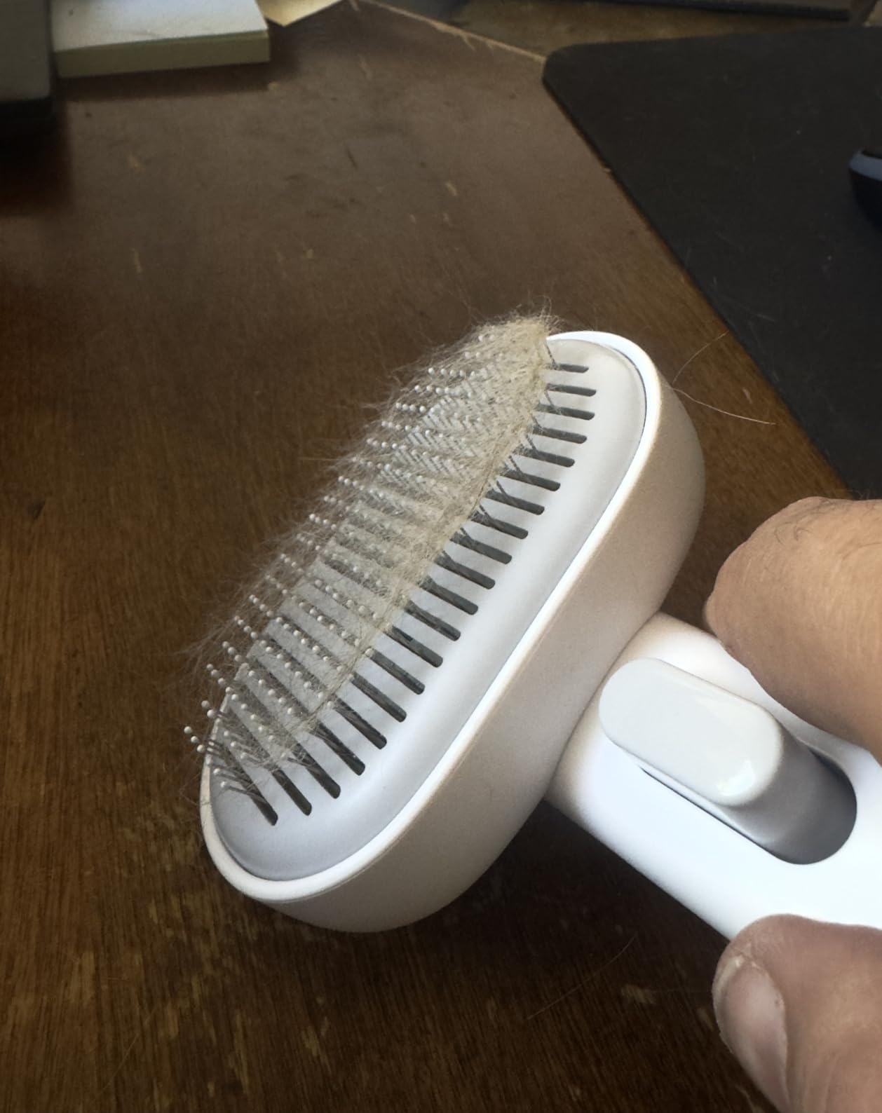 Aumuca Skin Friendly Self-Cleaning Slicker Brush for Dogs & Cats, Gentle Pet Grooming Tool for Shedding & Deshedding, Efficient Hair Remover for Long & Short Haired Pets customer photo 1