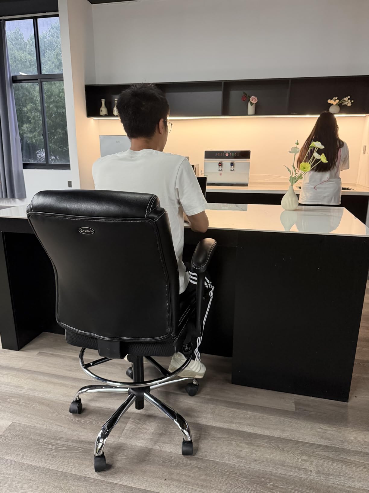 Ergonomic Mid-Back Premium Faux Leather Adjustable Drafting Chair with Multi-Function Arms and Foot Ring, Standing-Desk Matched Tall Swivel Computer Office Stool, Black customer photo 1