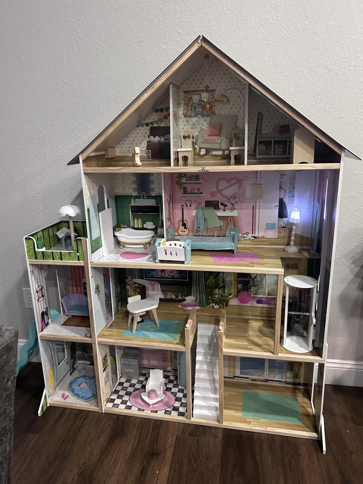 Delta Children Deluxe Maui Dollhouse - Large 4-Story Dollhouse with 12 Rooms Includes 50 Accessories - Working Elevator, Wave Slide, Lights/Sounds - Fits 12-inch Dolls - Pretend Play Gift for Ages 3+ customer photo 2