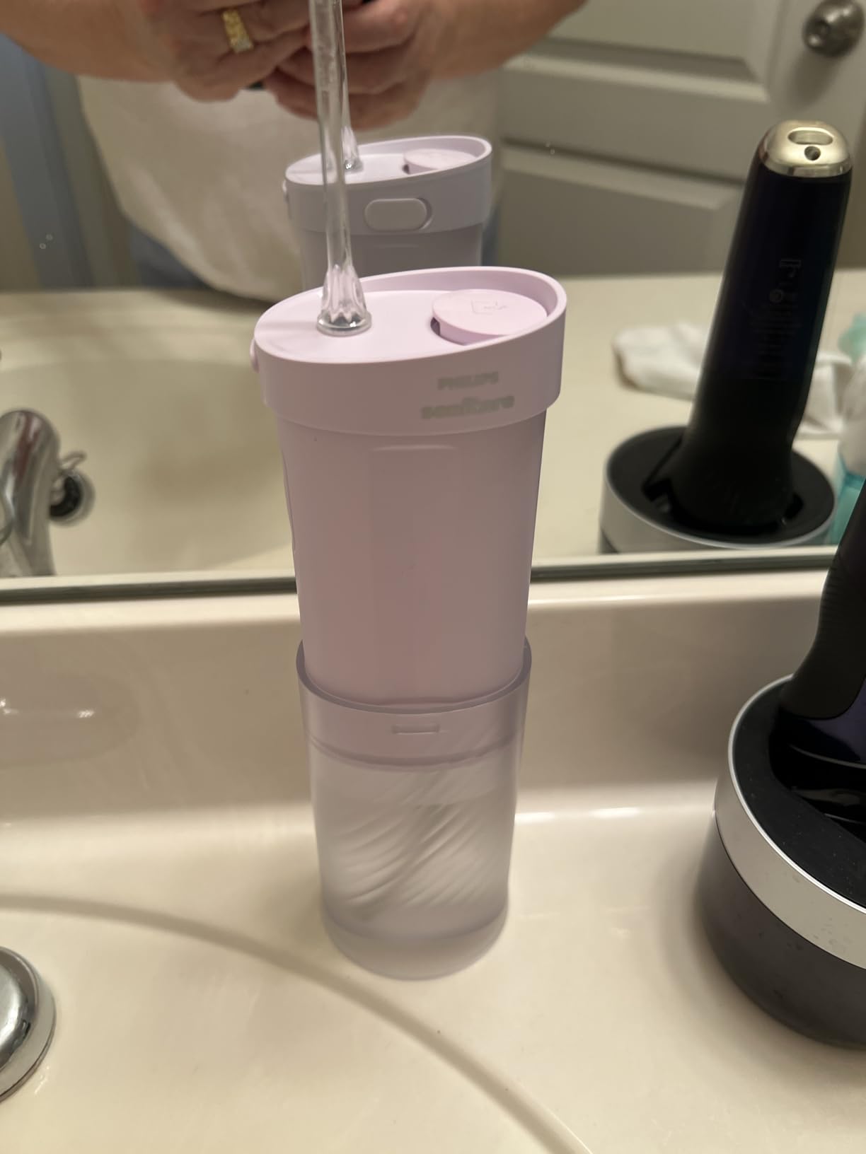 Philips Sonicare Compact Flosser 1000, Portable Water Flosser with 3 Flossing Modes, IPX7 Waterproof Oral Irrigator, Travel Friendly, Blue, Model HX3333/24 customer photo 2